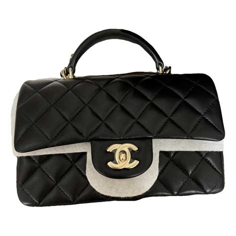 chanel timeless classique top handle leather handbag